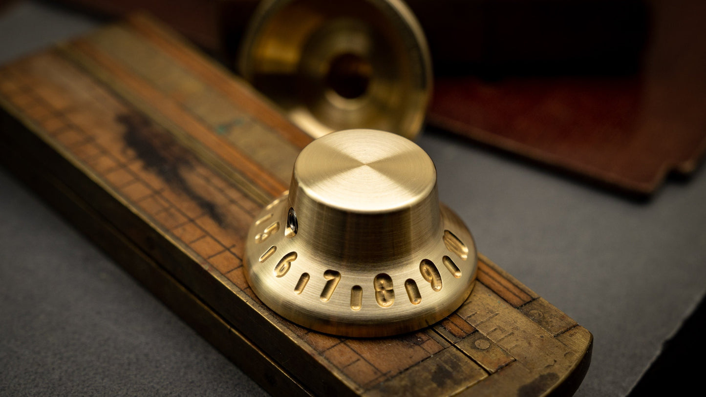 Brushed Brass Gibson Tophat Guitar, amp, pedal knob