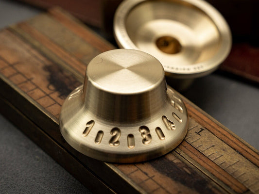 Brushed Brass Gibson Tophat Guitar, amp, pedal knob